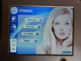a picture of a woman on the screen of a machine