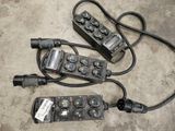 three different types of power cords connected to a power strip