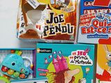 a lot of toys and books on the table
