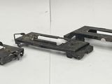 a toy train that is sitting next to other toy trains