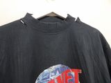 the back of a black shirt with a red and blue planet on it
