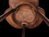 an image of a close up of a wooden chair with two wooden poles