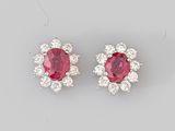 une paire de boucles d'oreilles en rubis et diamants