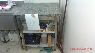 a picture of a kitchen with a sink and a counter