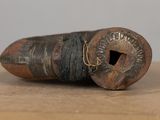 an old pipe that is sitting on a table