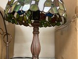 a lamp that is sitting on a table next to a box
