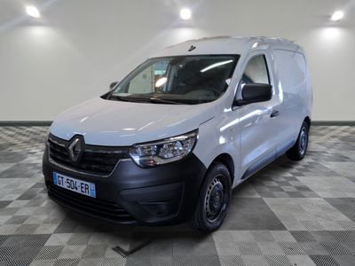 the white van is parked on a checkered floor in a room