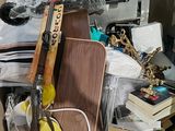 a pile of clutter in the corner of a room