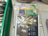a bag of fish on the floor next to a bag of fish