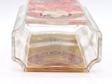 a glass box with a lid that has a picture of a woman on it