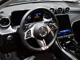 the interior of a car with a steering wheel and dashboard controls
