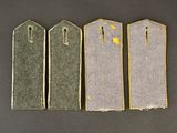 three tags are shown on a black surface with yellow paint