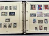 an open book with a lot of stamps on it