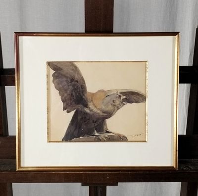 une photo d'un oiseau perché sur un chevalet