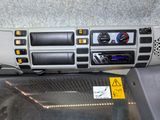 a car dashboard with a radio and other electronics on it