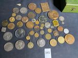 a lot of coins that are on a table