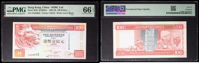 three different types of currency are on display in a display case