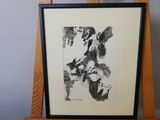 painting of a black and white abstract painting on a wooden easel