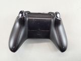 a close up of a video game controller on a table