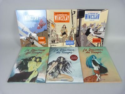 plusieurs livres sont empilés sur une table