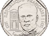 an image of a close up of a coin with a man ' s face