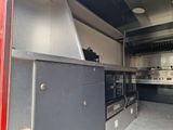 an image of a commercial kitchen with stainless steel appliances
