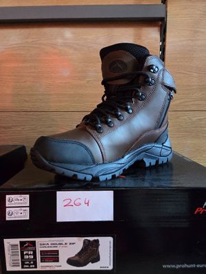 a box with a pair of boots on top of it