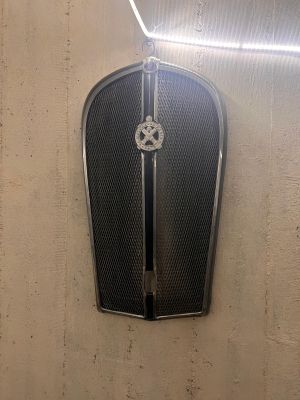 a wall with a clock on it in a room
