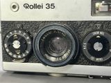 a close up picture of a camera with three different knobs