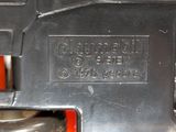 a close up of a metal object on a table