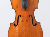 a close up of a violin with a bow on a white background