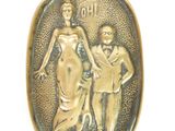 an image of a bronze plaque depicting a man and woman
