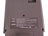 a close up of a nintendo game system on a white surface