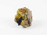 a close up of a piece of rock with colorful crystals on it
