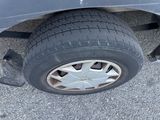 a car that has a flat tire on the road
