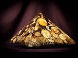 an image of a pyramid shaped object made out of rocks
