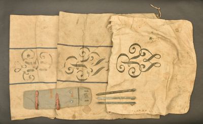 a piece of cloth with a design on it and a pair of scissors