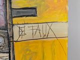 a painting on the wall of a building with a sign on it