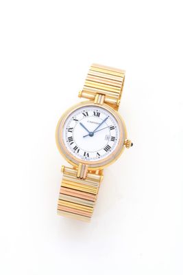 an image of a woman ' s wrist watch with roman numerals