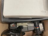 a box with a camera and other items in it
