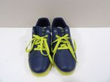 pair of blue and yellow tennis shoes with yellow laces