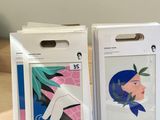 two boxes of apple airpods are sitting on a table