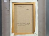 an old picture frame with a piece of paper in it
