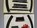 a box with a train set in it on a table