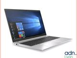 an open laptop computer sitting on top of a white surface