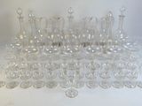 a lot of empty wine glasses sitting on a table