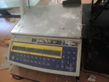 an image of a scale sitting on top of a table
