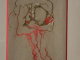 painting of a nude woman with a red frame on a white wall