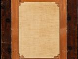 an old wooden frame with a piece of paper in it