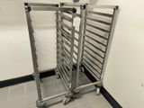 a metal rack with a bunch of trays on it
